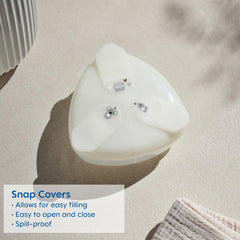 MAM spill-proof dispenser in diaper bag demonstrates flat, bag-friendly design.