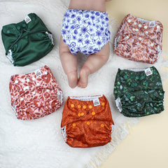Mama Koala 3.0 pocket diaper snug leg openings reduce leaks.
