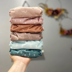 Mama Koala 3.0 suede interior visible, keeping baby dry and comfortable.