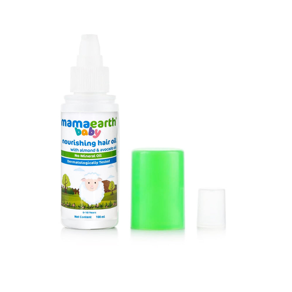 Mamaearth baby nourishing hair oil label highlights natural ingredients and dermatologist-tested safety.