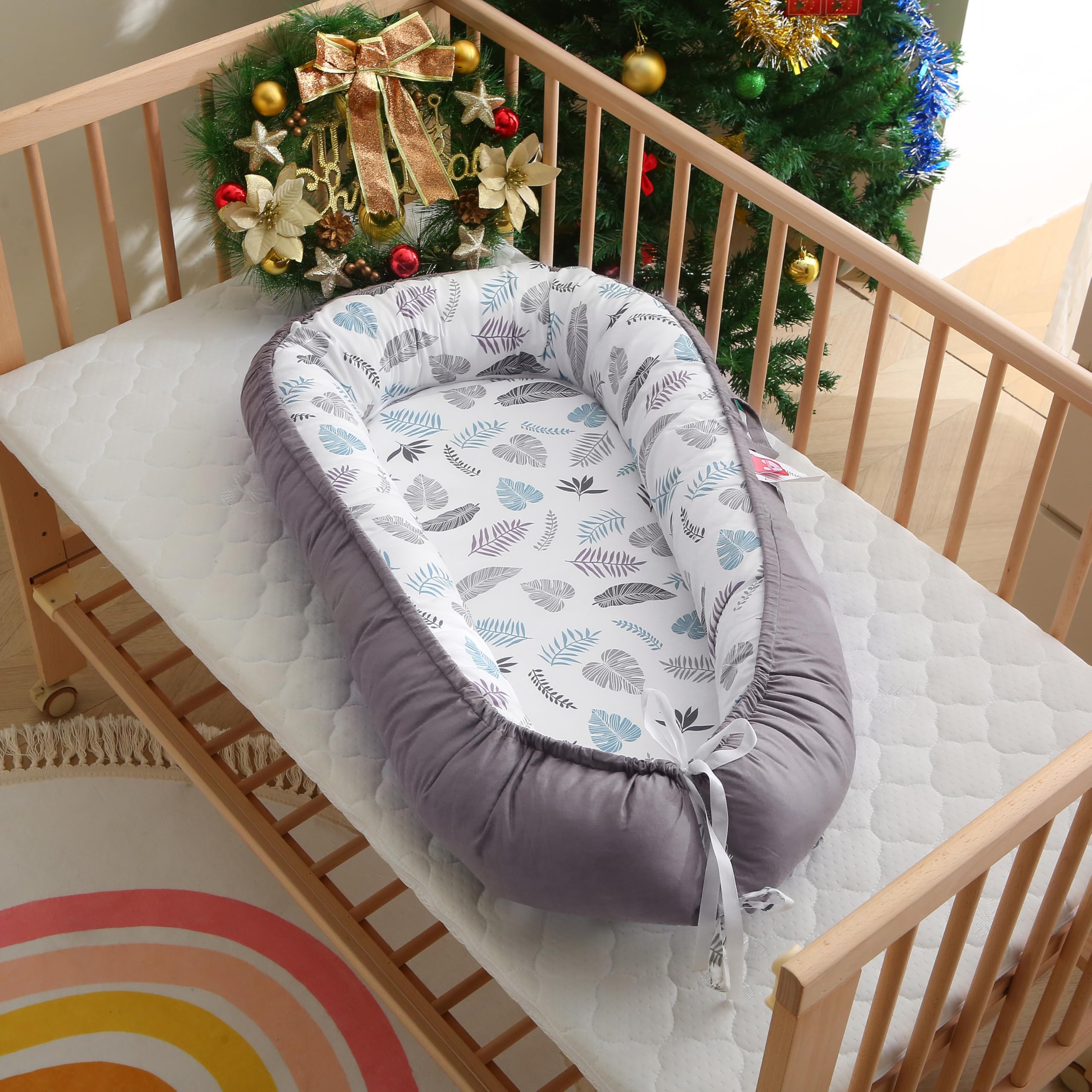 MAMAJOVE baby nest lounger adjustable size fits 0-24 months.