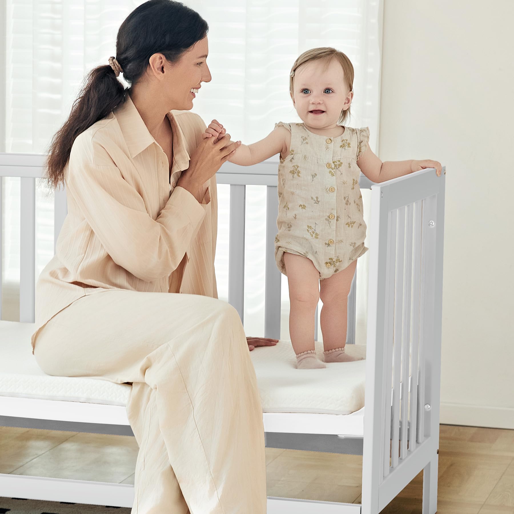 MAMAZING Evonest adjustable height feature helps caregivers reach newborns comfortably