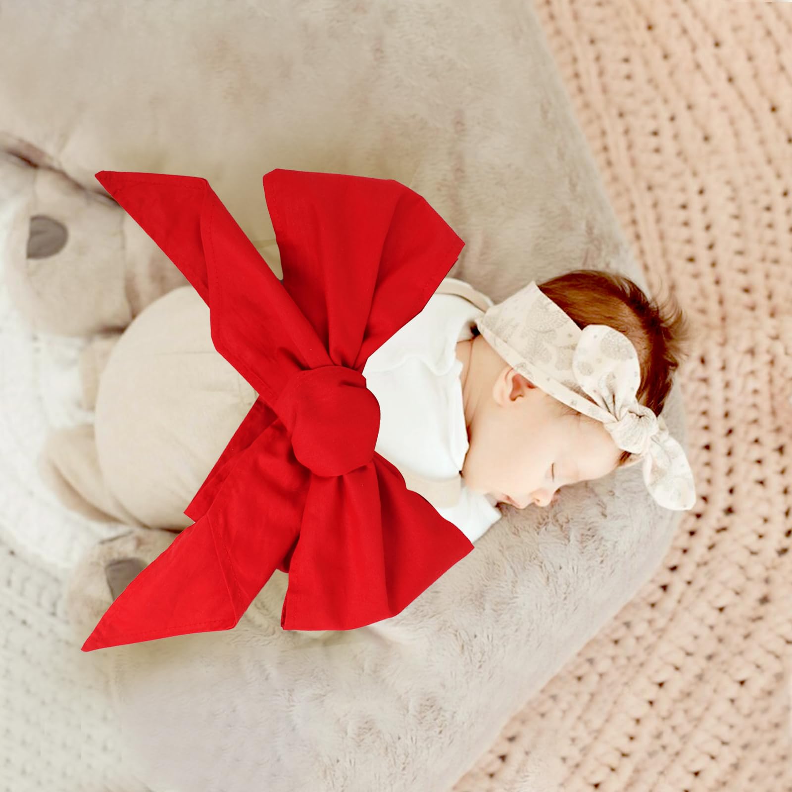 Man Fai Sky bowknot detail on newborn swaddle sash adds visual charm