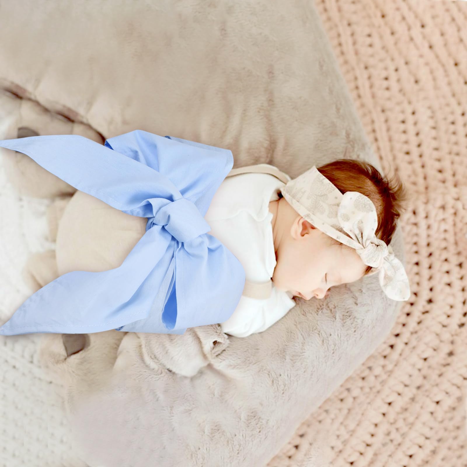 Man Fai Sky soft cotton texture swaddle sash on blue fabric.