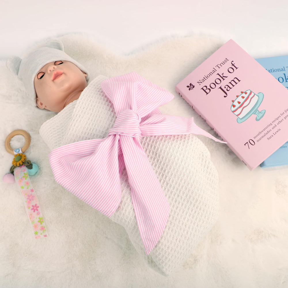 Man Fai Sky sash used as wreath decor to complement baby themes