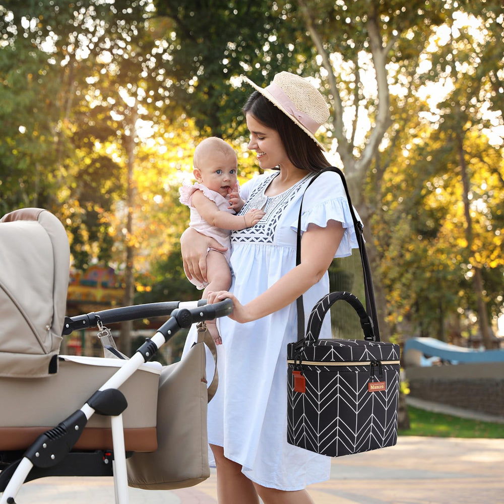 Mancro cooler bag attaches to a stroller for hands-free mobility while out with baby.