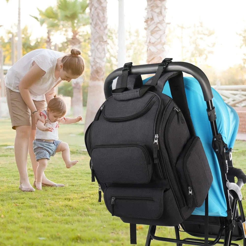 Mancro diaper bag insulated bottle pockets keep bottles at the right temperature