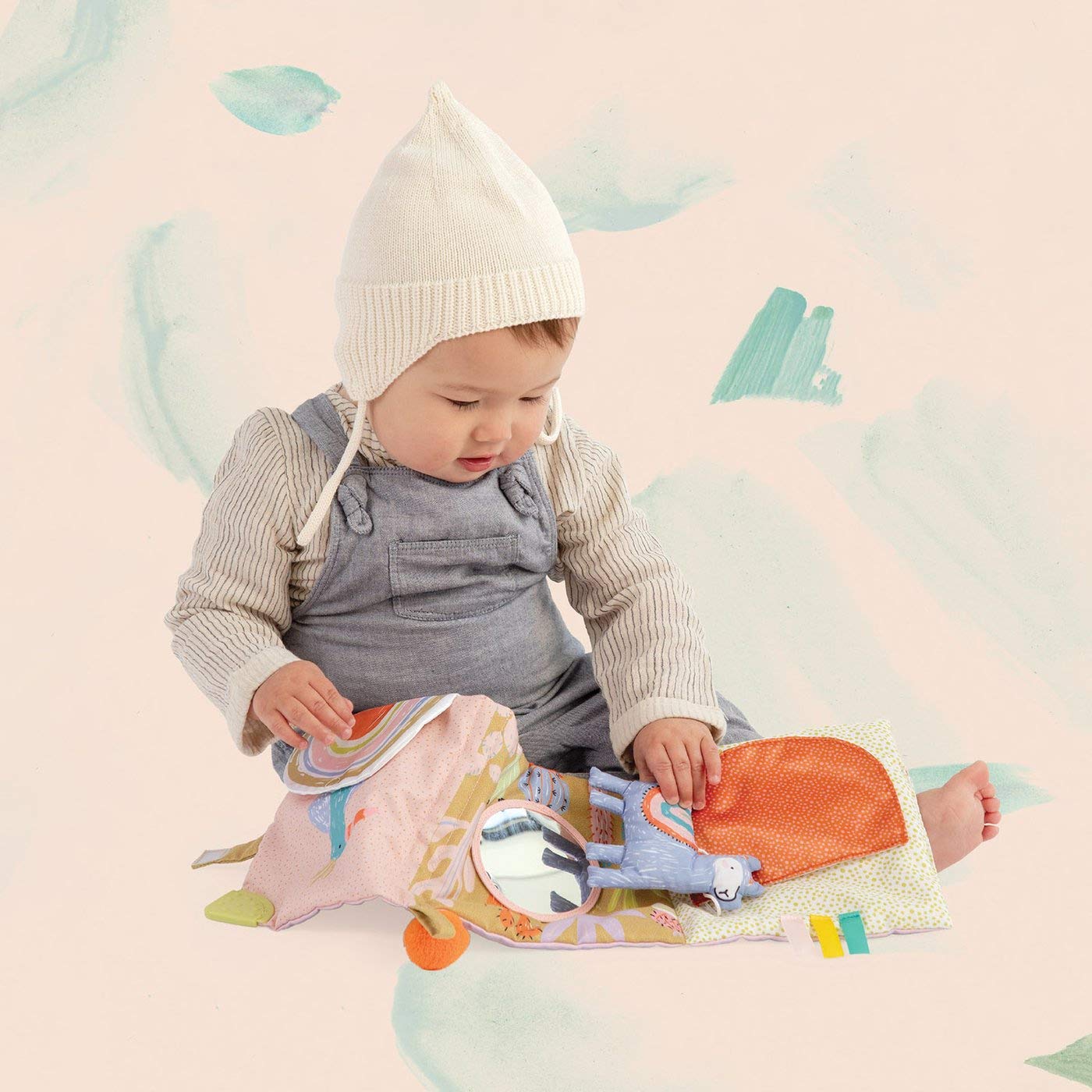 Manhattan Toy Llama soft book safety-tag, signals trusted craftsmanship.