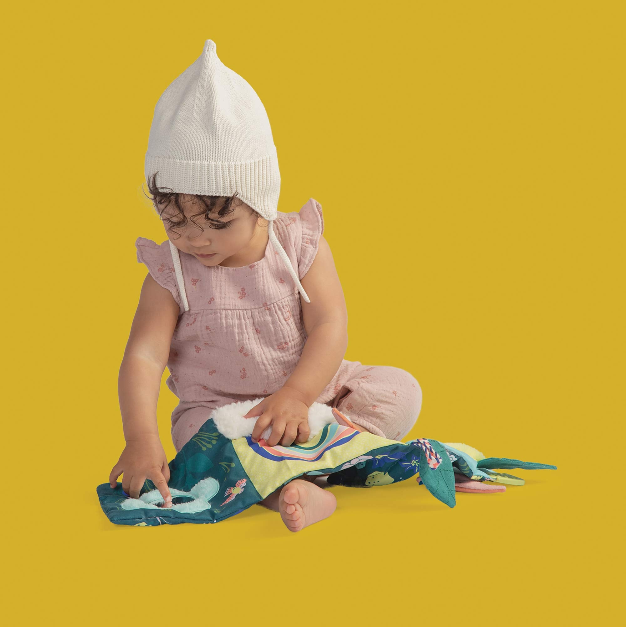 Manhattan Toy Songbird Pat Mat folded compact for easy storage