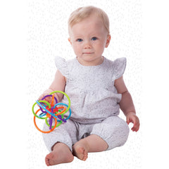 Manhattan Toy Winkel center cube rattle, quiet sound encourages cause-and-effect play.