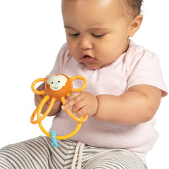 Manhattan Toy Winkel Monkey teether tubes closeup showing BPA-free material for soothing gums.