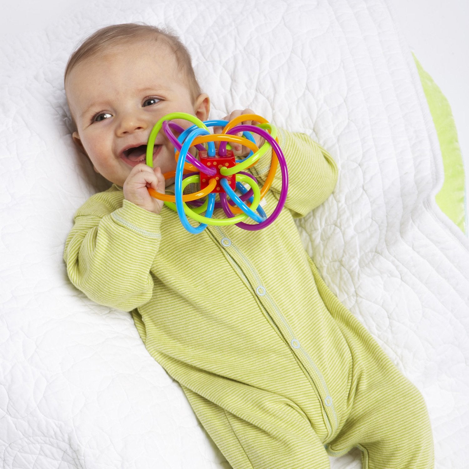 Manhattan Toy Winkel teether loops, BPA-free material for safe mouthing and soothing gums.