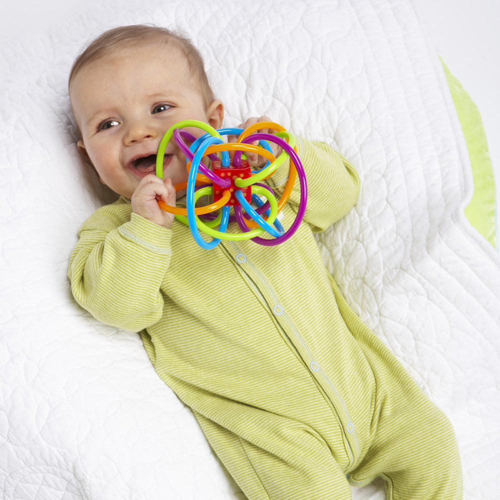 Manhattan Toy Winkel teether loops, BPA-free material for safe mouthing and soothing gums.
