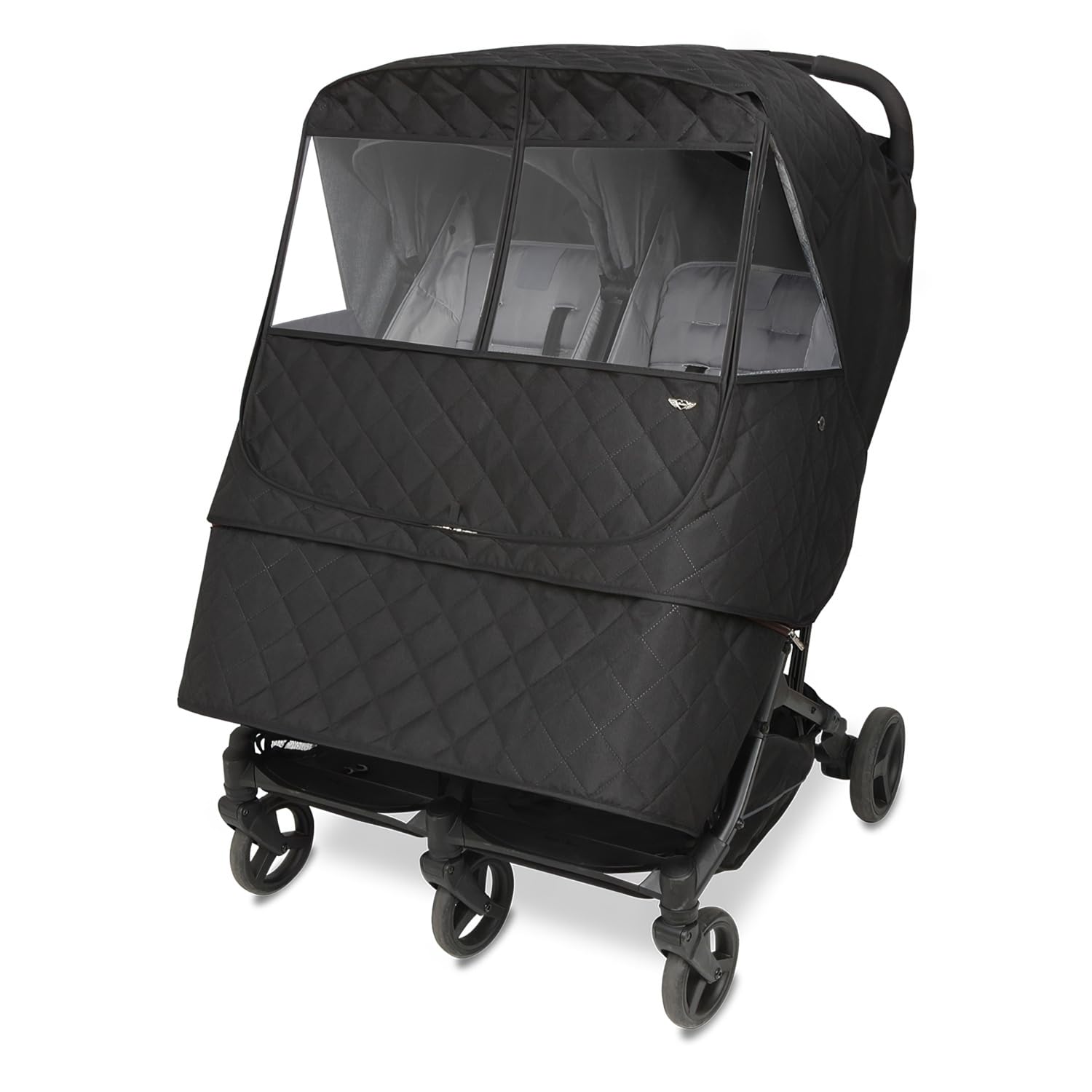 Manito Melange weather shield for twin strollers with water-repellent exterior protecting from rain.