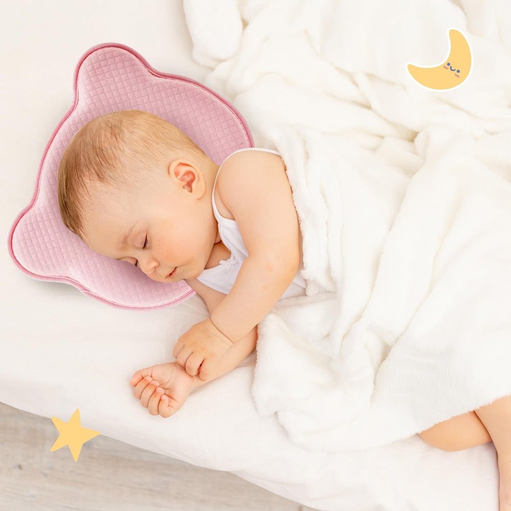 MarBoost pink bear pillow shown in a cozy bedside setup.