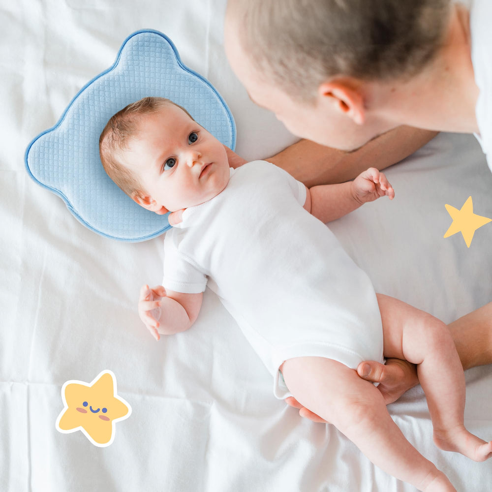 MarBoost travel-friendly blue pillow fits infant crib or stroller for on-the-go.