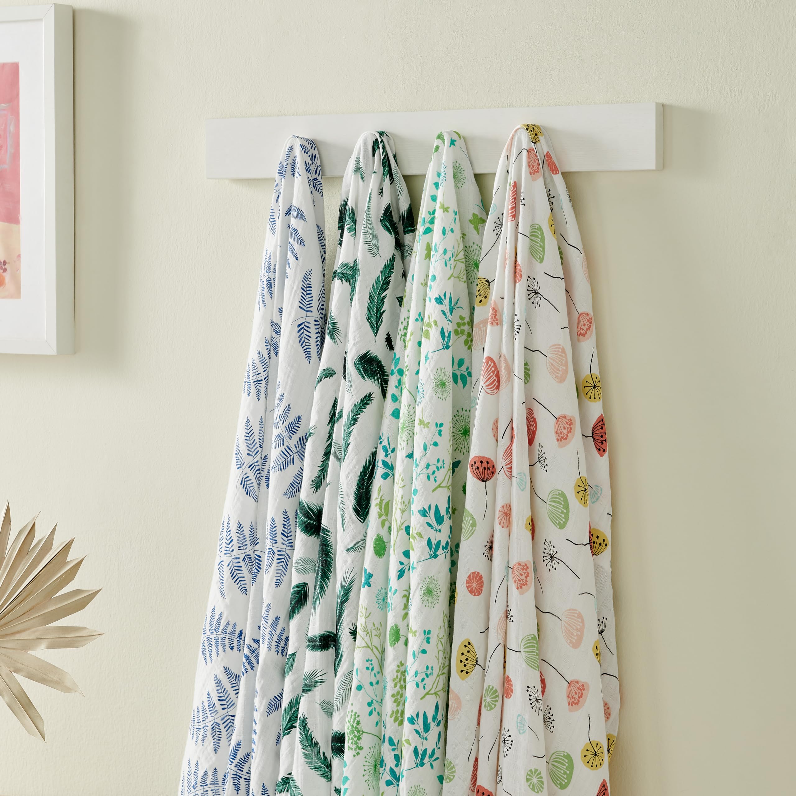 Margaux & May muslin swaddle soft-fold shot, airy fabric wraps baby comfortably.