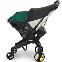 Marsheepy sunshade extension snapped on the Doona stroller for shaded baby comfort.