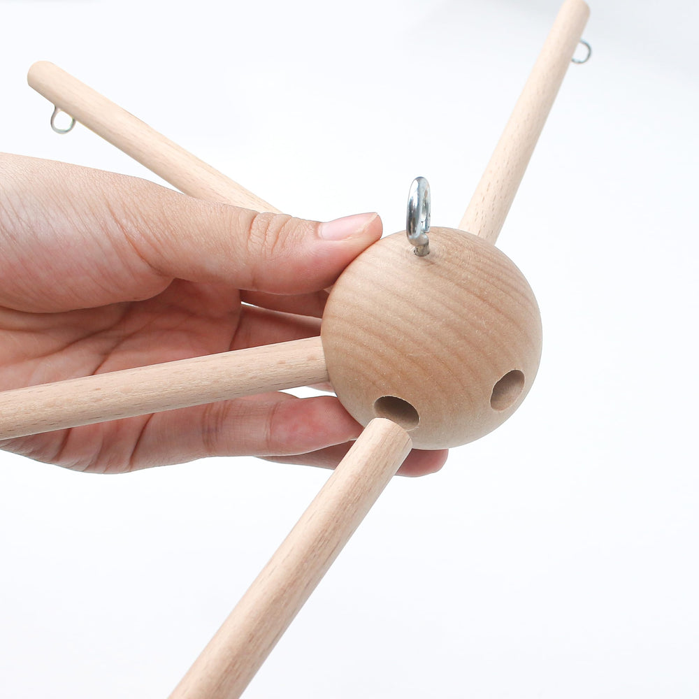 Marsrut Natural Wood Mobile Design emphasizes non-toxic materials in a warm nursery aesthetic.