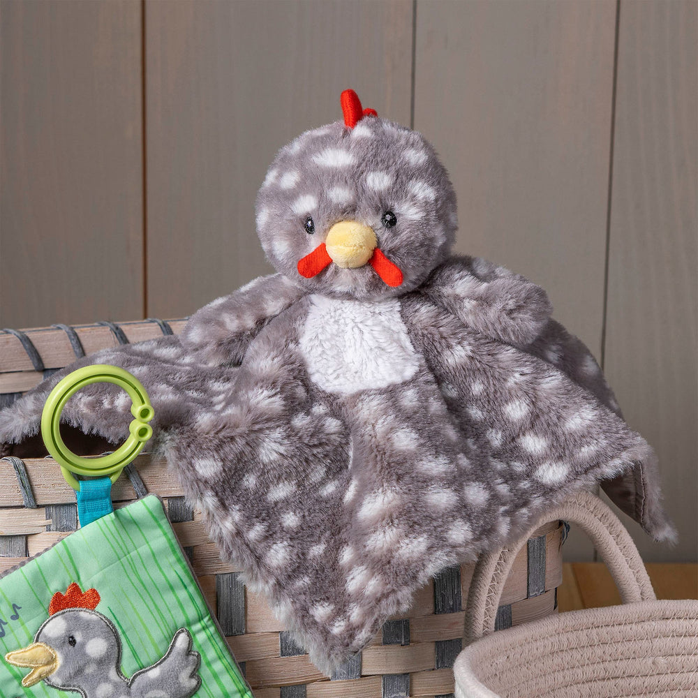 Mary Meyer Rocky Chicken close-up shows embroidered eyes and soft beak for safe exploration.