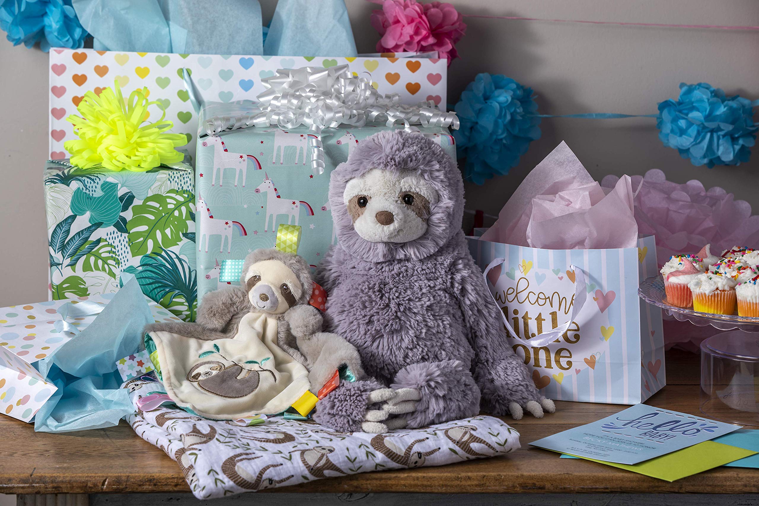 Mary Meyer Taggies Molasses Sloth cuddling moment supports bonding during play.