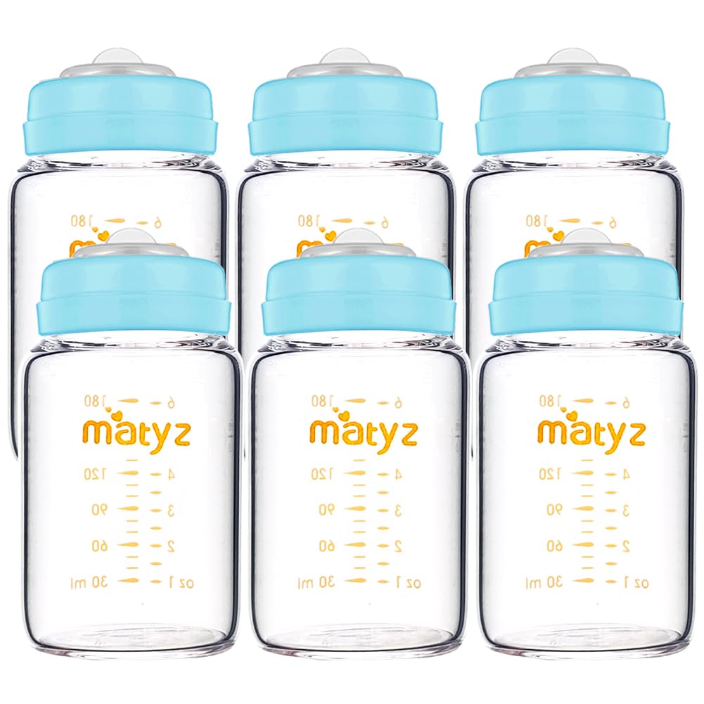 Matyz glass breastmilk bottle set with wide-neck design and blue lids for easy storage and pumping.