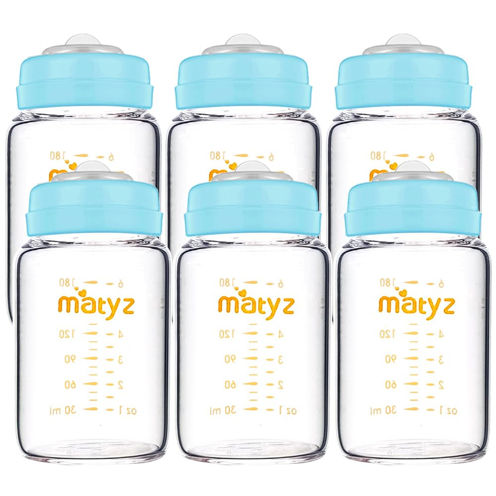 Matyz glass breastmilk bottle set with wide-neck design and blue lids for easy storage and pumping.