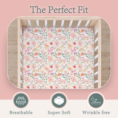 Max&So floral crib sheet on crib mattress showing 9-inch deep fit for versatility.