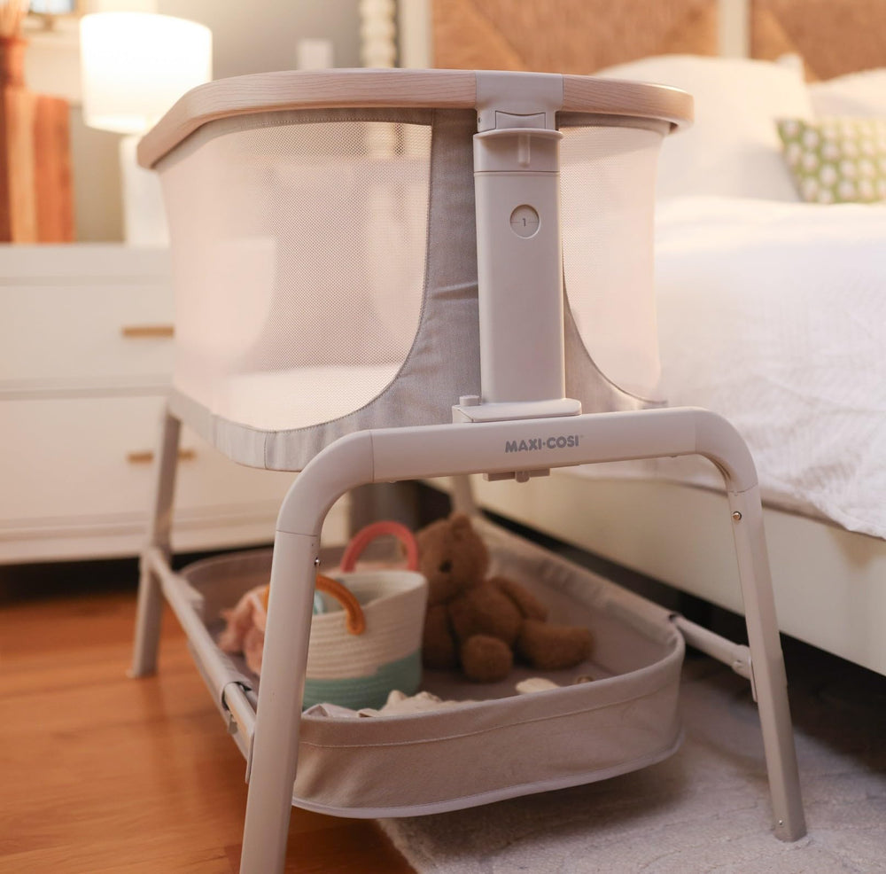 Maxi-Cosi Iora bassinet assembly image shows simple setup for busy parents.