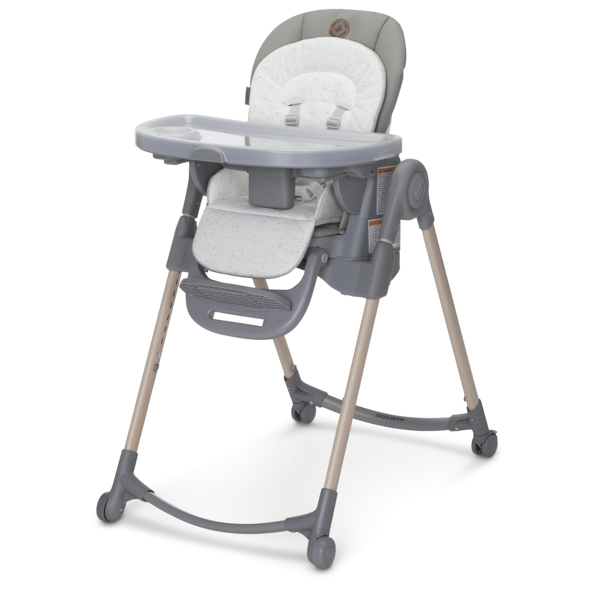 Maxi-Cosi Minla folded high chair green shows space-saving portability ideal for small kitchens.