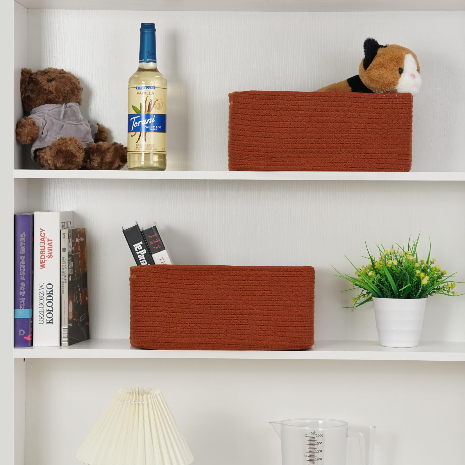 Maxuni baby nursery setup showcasing soft storage basket for toys and blankets.