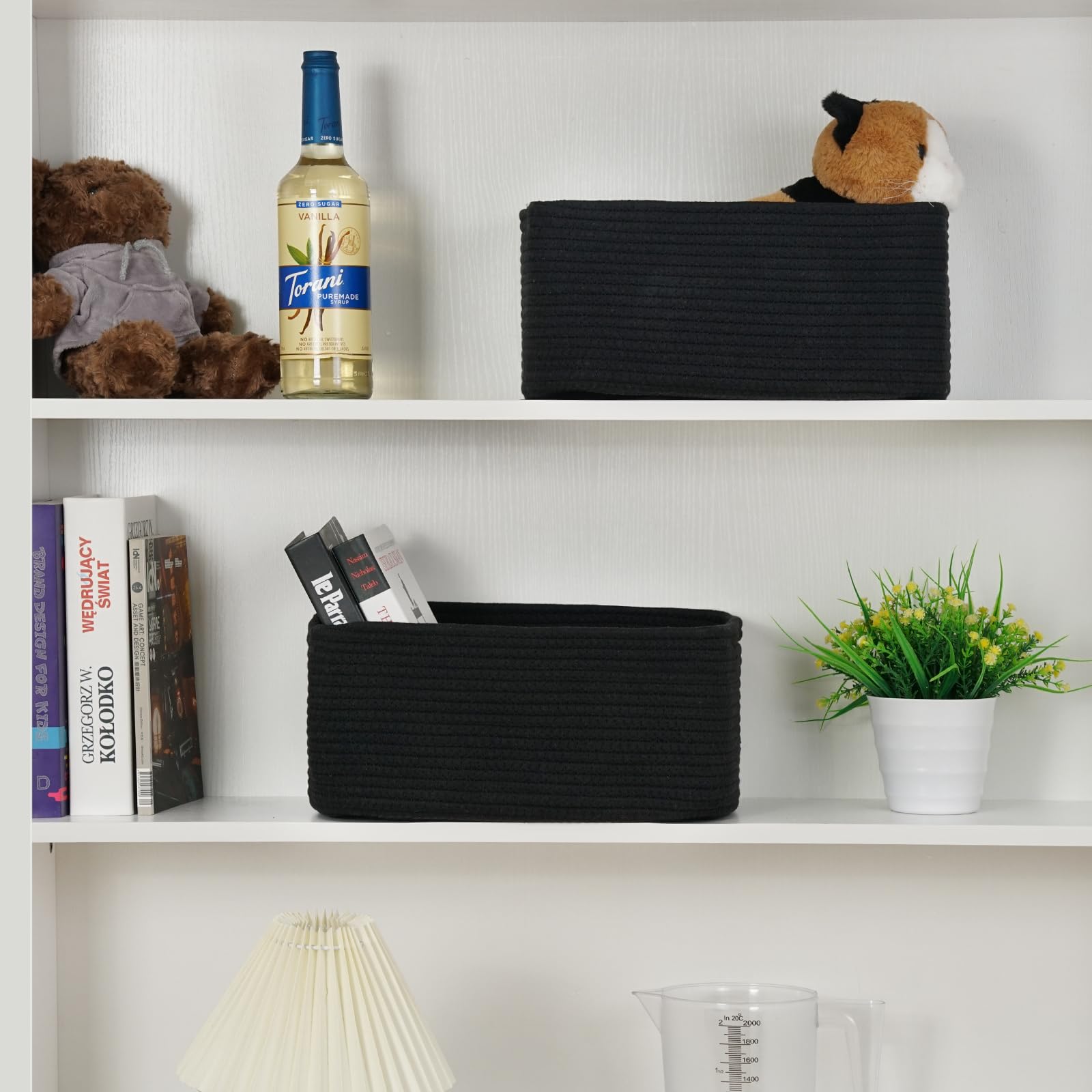 Maxuni mixed-black decor basket sits stylishly as a decor-friendly storage solution.