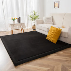 MAXYOYO Baby Play Mat memory foam layer close-up showing supportive padding.