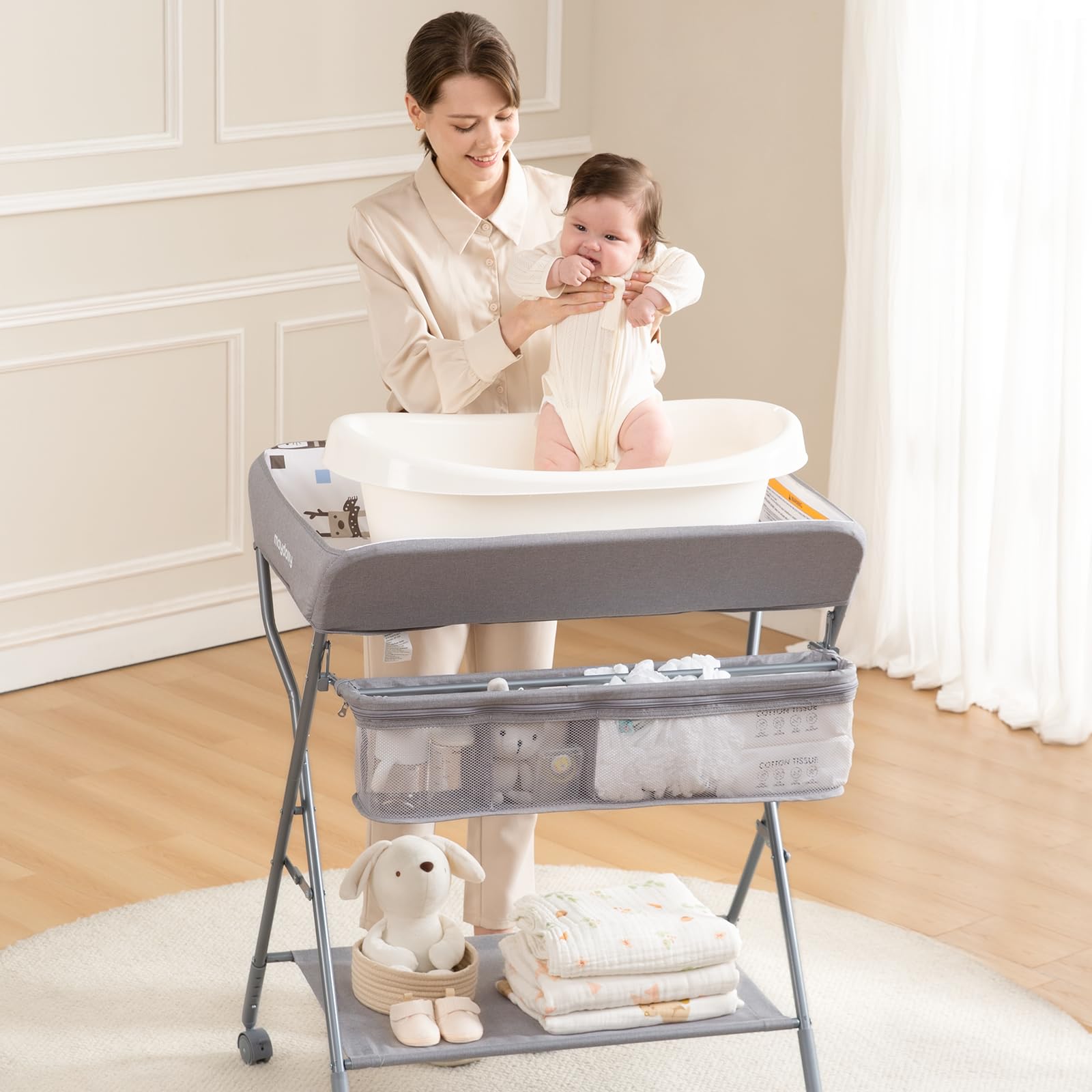 Maydolly adjustable-height changer suitable for comfortable diaper changes and wardrobe adjustments.