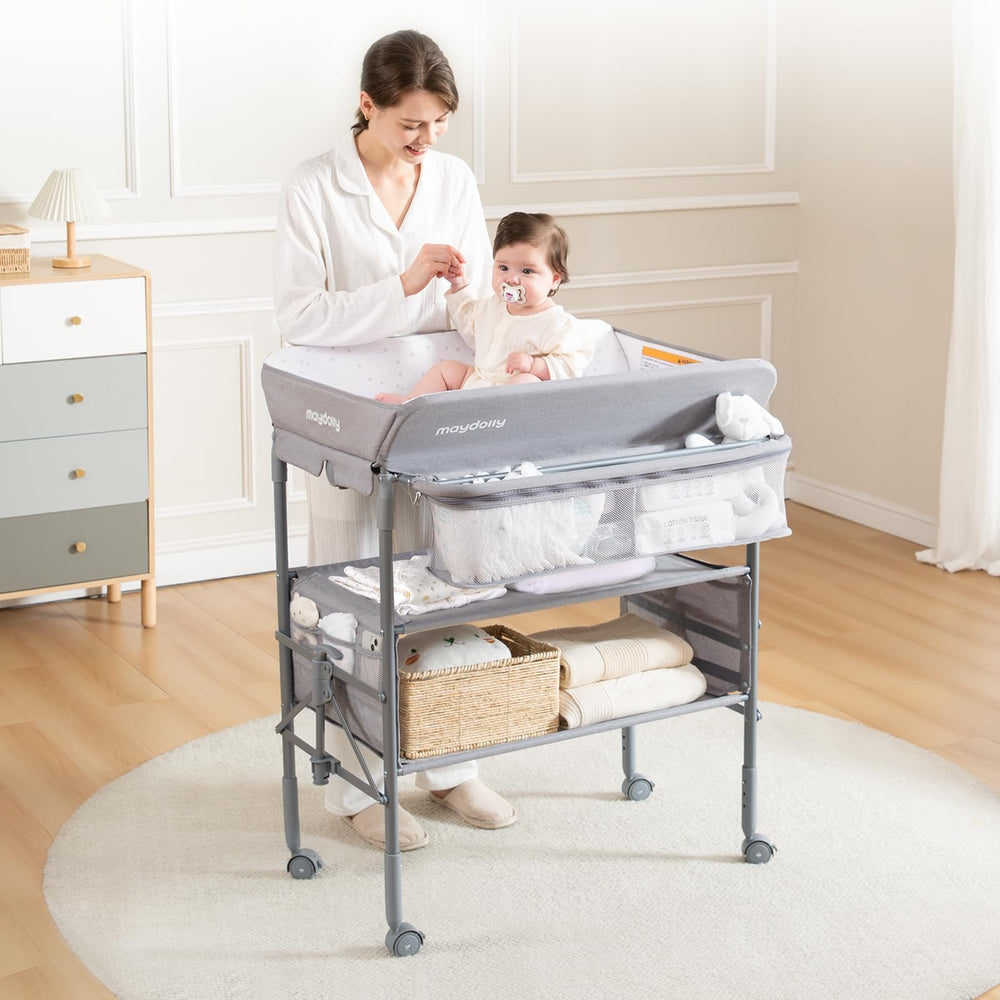 Maydolly baby-changing-table-height-adjustment enables ergonomic raising.