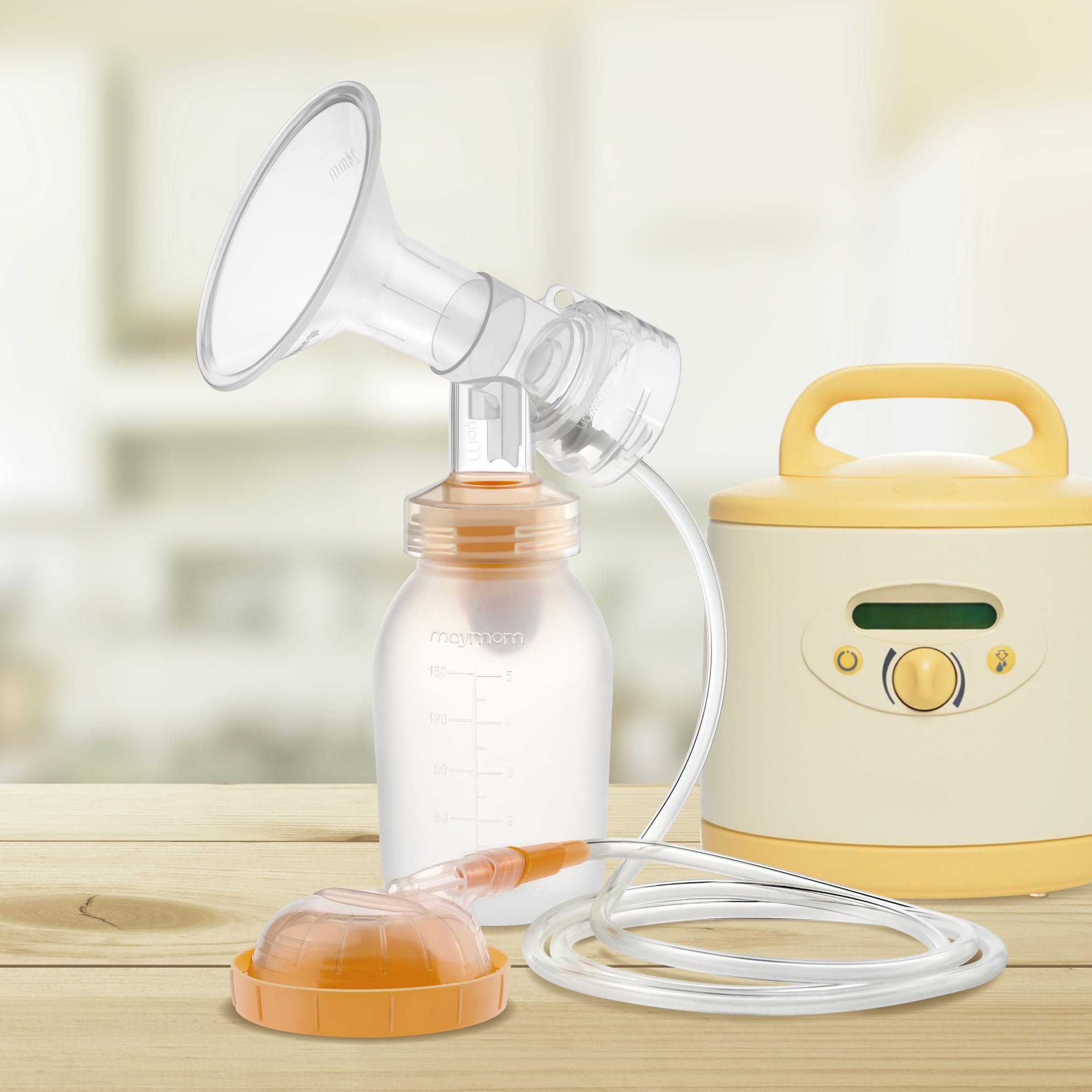 Maymom Symphony-cap compatibility image highlights complete Medela fit and secure performance