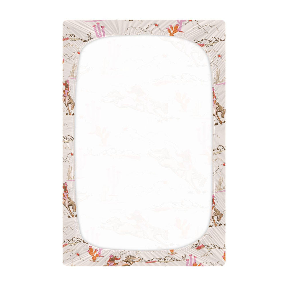 Mazeann 52x28x9 crib sheet fit demonstrates secure elastic band.