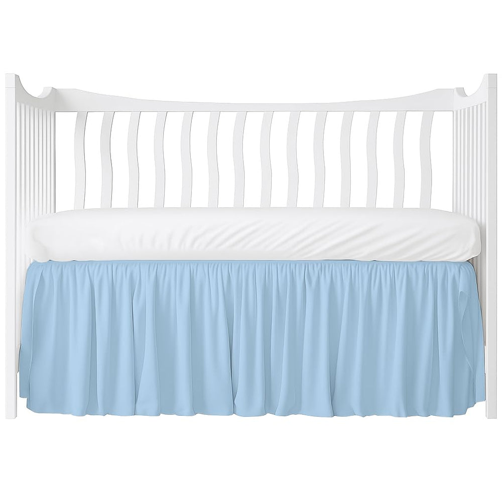 MD Home Decore crib skirt in light blue flatlay, showcasing soft cotton finish for nursery styling