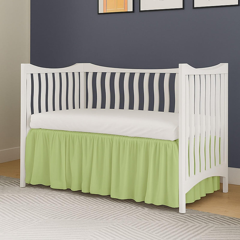 MD Home Decore crib skirt on mattress adds soft, baby-friendly finish.