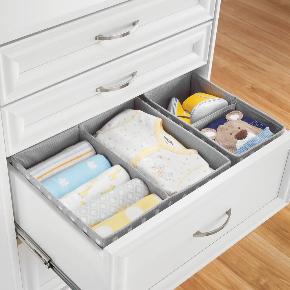 The mDesign bin fits neatly on closet shelves for quick toy and outfit access.
