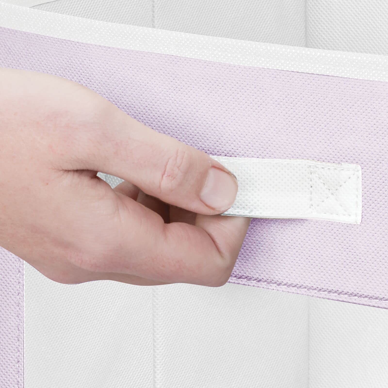 mdesign breathable non-woven fabric helps airflow around plush toys and linens.