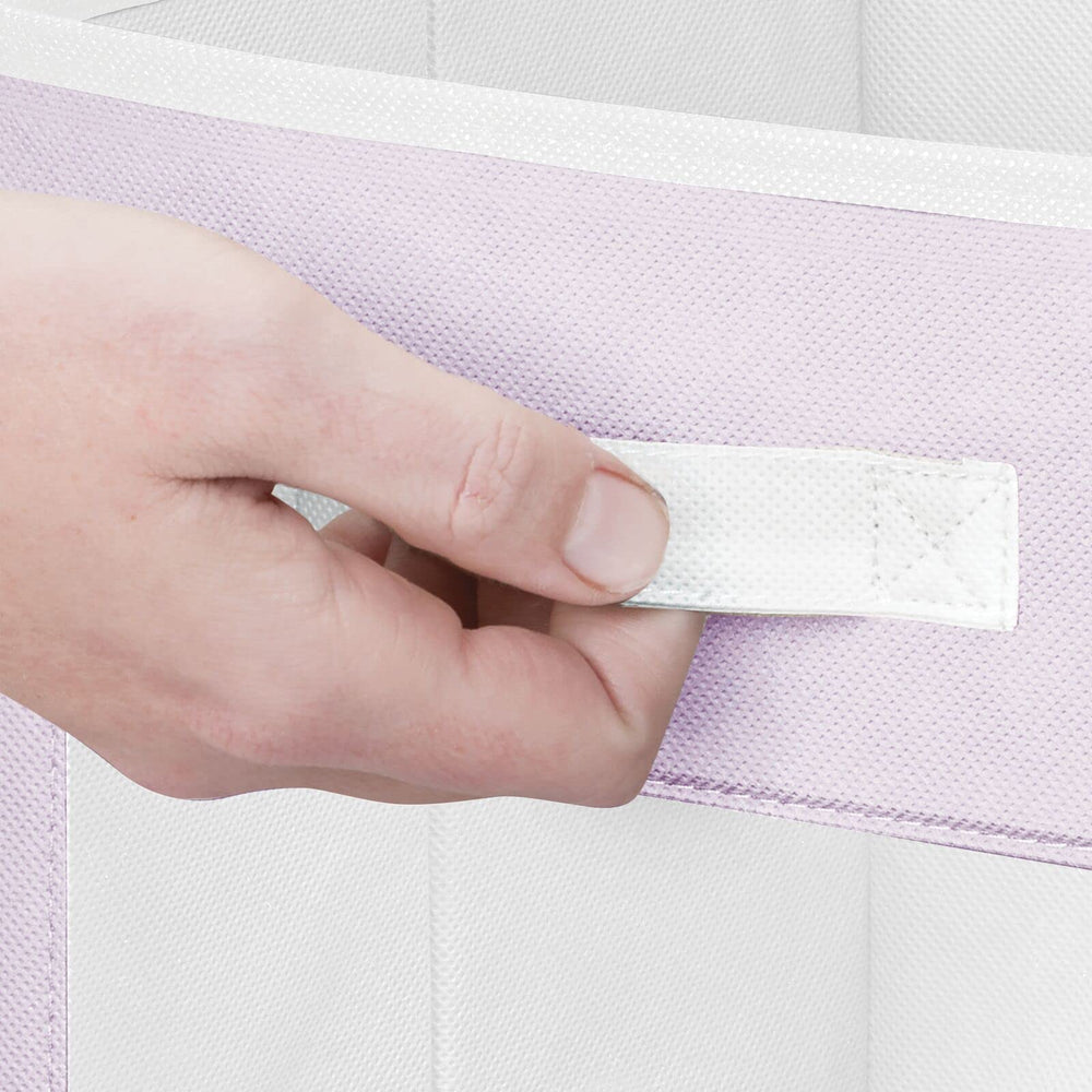 mdesign breathable non-woven fabric helps airflow around plush toys and linens.