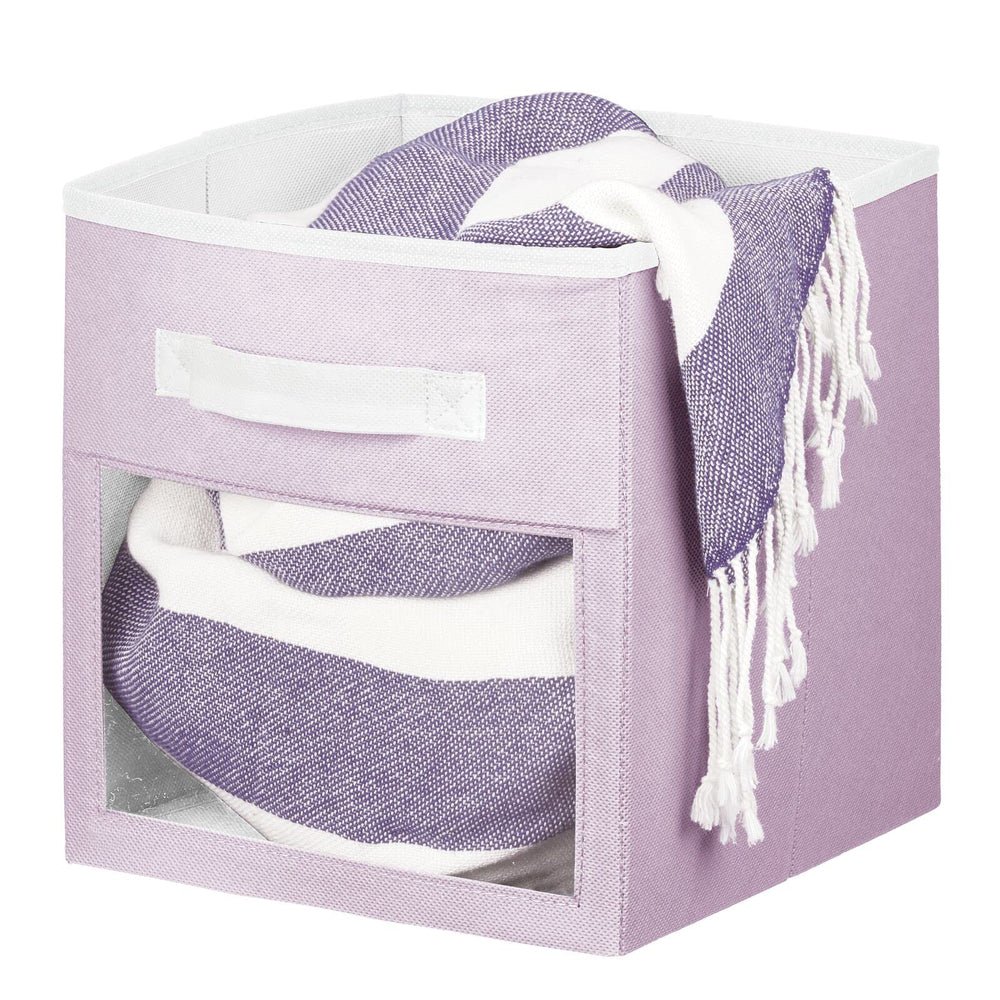 mdesign jane collection lilac bin adds soft color to playroom organization.