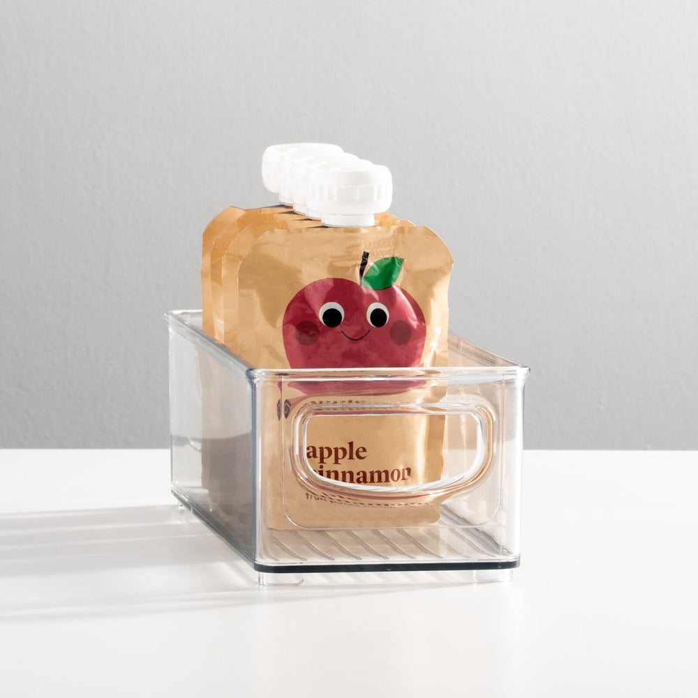 mDesign Ligne clear bin demonstrates stackable design for compact fridge or cabinet organization.