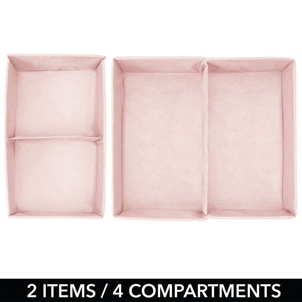 mDesign pink polka dot bin in playroom for toy organization.