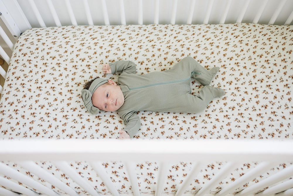 Mebie Baby Autumn Bloom muslin sheet features durable, easy-care fabric.