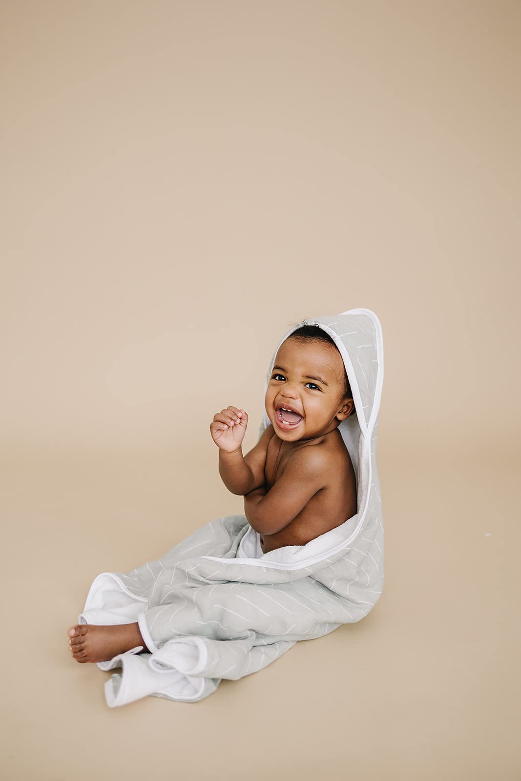 Mebie Baby bath-time scene with Desert Sage towel in use