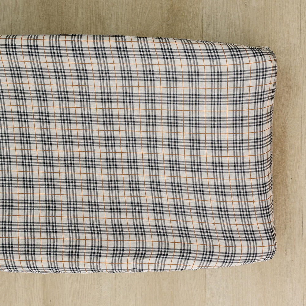 Mebie Baby changing pad cover in vintage plaid closeup shows soft muslin texture for baby skin.
