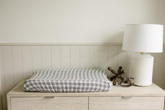 Mebie Baby vintage plaid cover after machine wash, showcasing easy cleanup for caregivers.