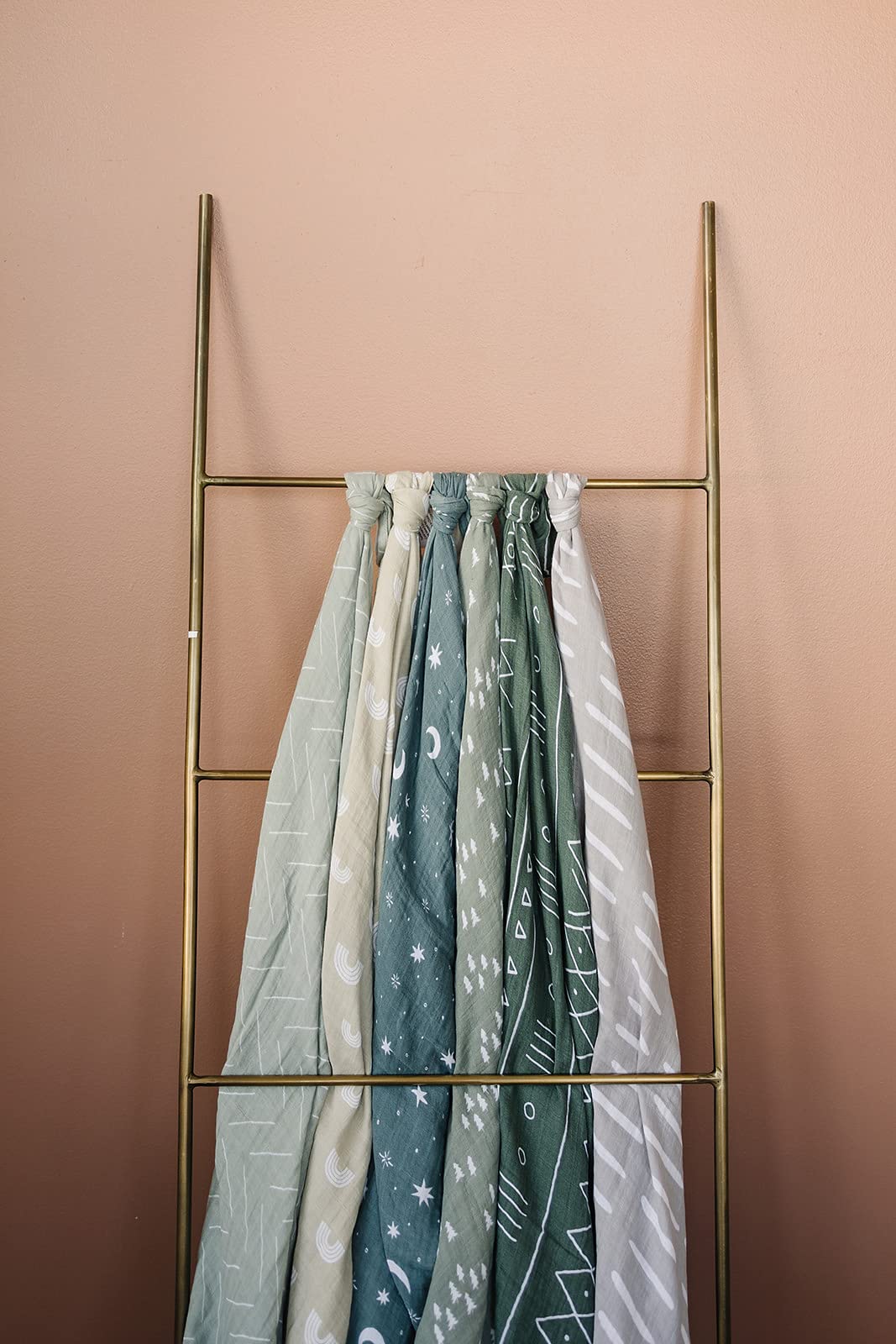 Mebie Baby swaddle folded flat to show generous 47x47 inch size.